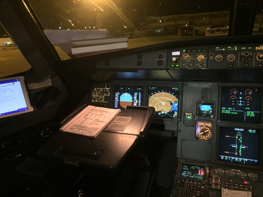 Airbus A320 cockpit at night